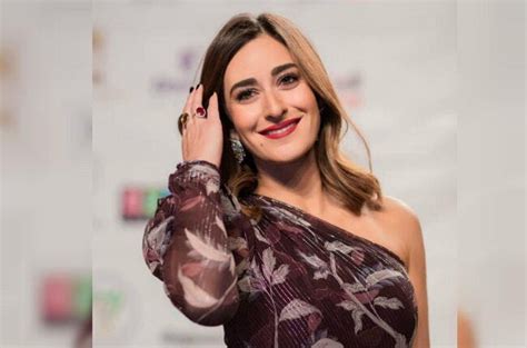 Taking a Closer Look at Amina Khalil's Physical Appearance and its Impact on Her Success